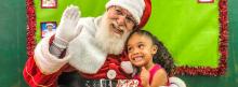 Crianças da zona norte de São Paulo recebem visita do Papai Noel